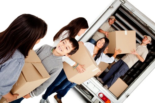 Loading furniture into a hire truck near Saintpancras