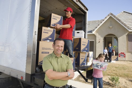 Removal team preparing safety equipment for a move