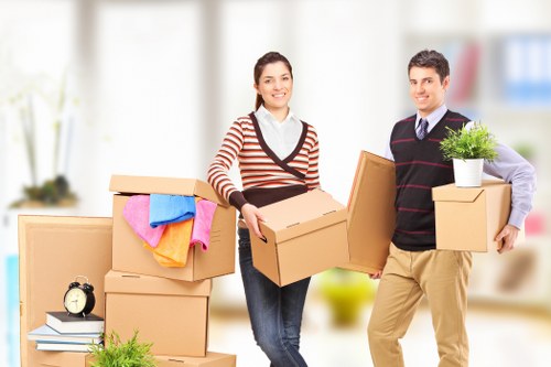 Packing boxes and preparing for a move in Saintpancras