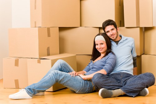 Professional movers handling fragile items during a Saintpancras relocation