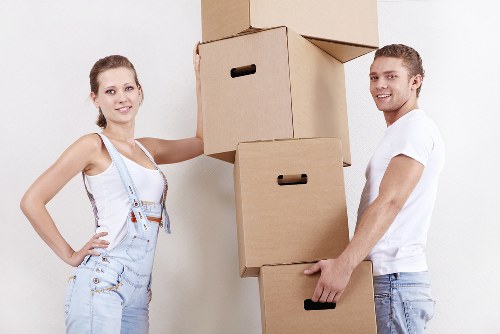 Moving team handling household furniture removals in Saintpancras