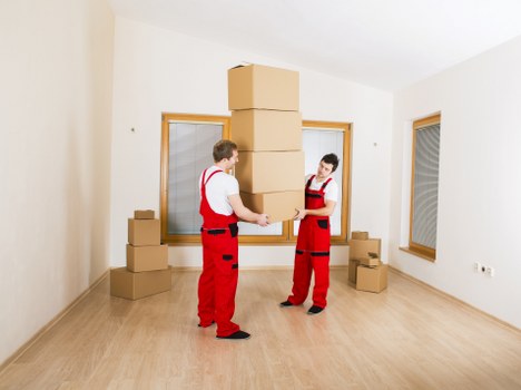 Professional movers loading furniture for same day removals in Saintpancras